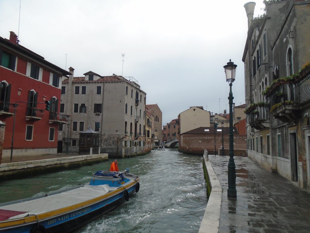 cargo boat on a venice canal