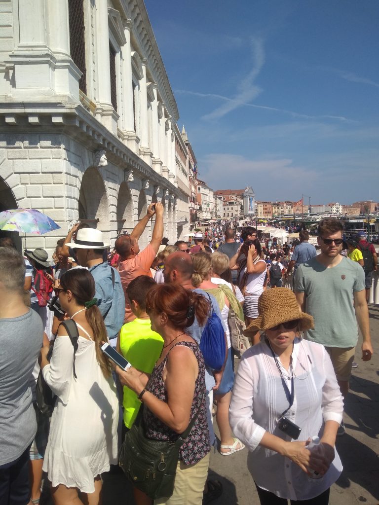 full of people tourism venice